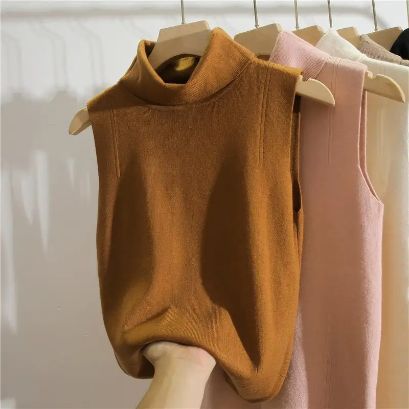 الياقة المدورة بلا أكمام سليم  - مراجعة Winter Clothing Essential وسعره